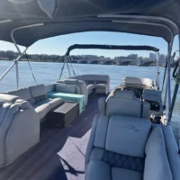 Pontoon boat interior with river and bridge